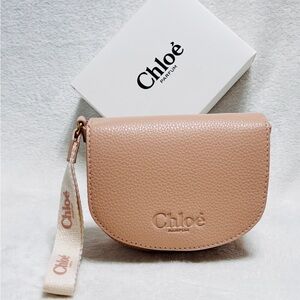 Chloe’ wristlet in blush pink leather.
